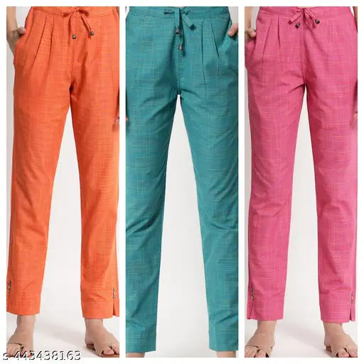 Colorful men's pants set: orange, green, purple. Cotton chino material