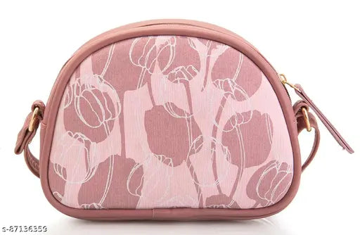 Pink fabric bag with handle, open top, black accents