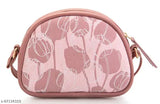 Pink fabric bag with handle, open top, black accents
