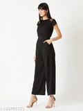Black crepe women's jumpsuit by Miss Chase, solid design with short cap sleeves, belted fit, size XS-XL