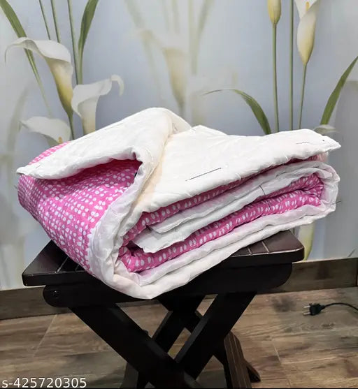 Red/white reversible cotton kids quilt, designer pattern on cozy bedding for children aged 0-5 years