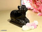 Black marble Nandi idol, intricately carved black stone sculpture for pooja, Indian craftsmanship