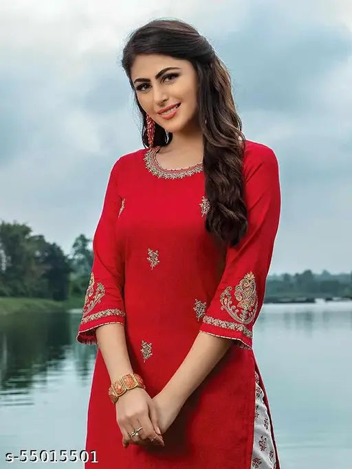 A printed kurti with a skirt, in pink rayon