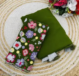 A vibrant, patterned Georgete saree with a lush green border