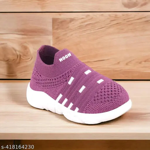 Purple canvas shoes with white sole and lace-up closure, suitable for all seasons