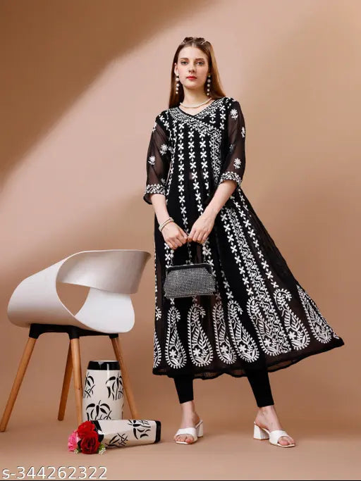 Black lace embroidered kameez with high neck and long sleeves, featuring flared hemline