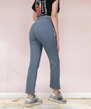 Grey stretchable premium high waisted denim jeans for women, with visible cargo pockets and a belt loop