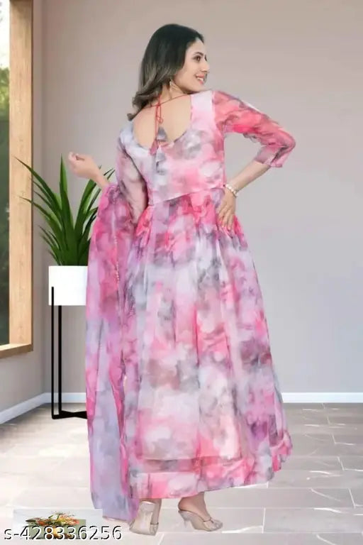 Pink organza three-quarter sleeve floral gown set with rich position print, India