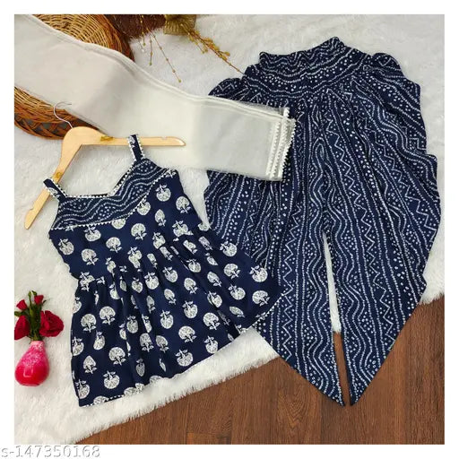 Blue kids' cotton kurti, dhoti, dupatta set - contemporary style with ruffle detail, color-block print, and elasticated waist. Perfect for summer outfits, parties, beachwear, or casual wear. Designed by Indian brand Nivudi