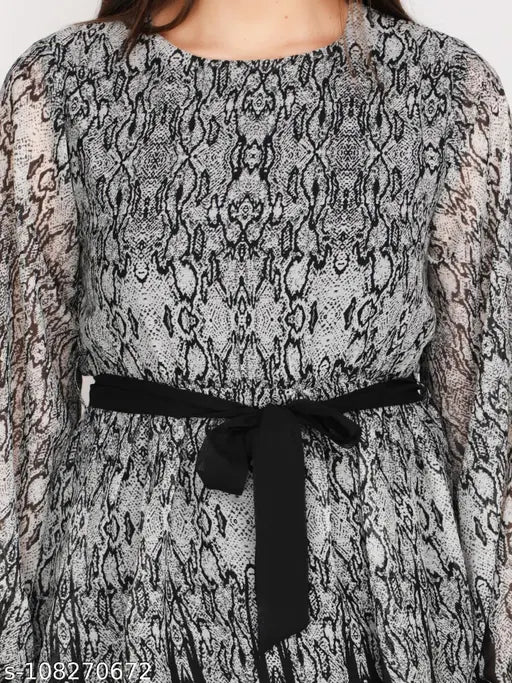 Black polyester snack print top with balloon sleeves, self-design net pattern, long sleeve length. Stylish and comfortable, perfect for XS, L, XL sizes. Made in India