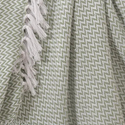 Green chevron patterned cotton throw with fringe details
