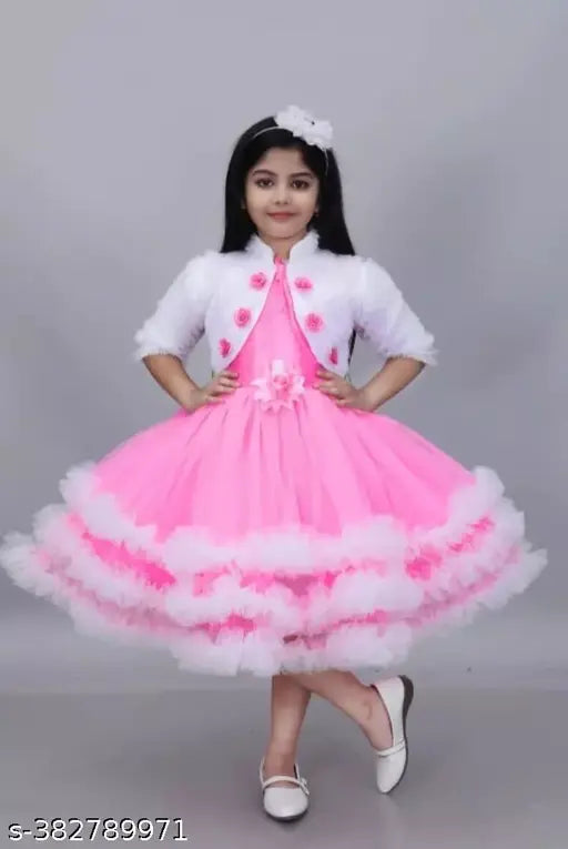 Pretty net silk pink & white one-piece festive dress for girls, India origin. Comfortable and stylish for 6-7 years old in solid net design
