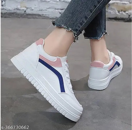 Synthetic white girls sneakers by WOGDAN for casual wear, lace-up design with PVC sole