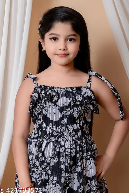Girl in a black and white floral off-shoulder dress