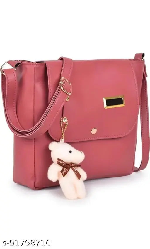 Maroon crossbody sling bag with teddy bear charm