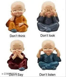 Handcrafted multicolor baby monk Buddha set (4 pieces), polyresin decorative showpiece from India