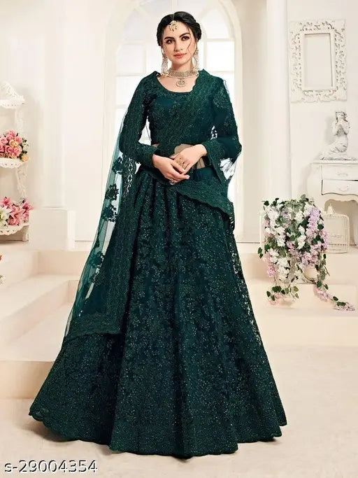Green embroidered net lehenga-choli set, semi-stitched Indian bridal wear with heavy zari and stonework
