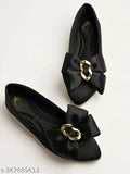 Black synthetic slip-on ballerinas with oversized bow detail, perfect for women's fashionable footwear