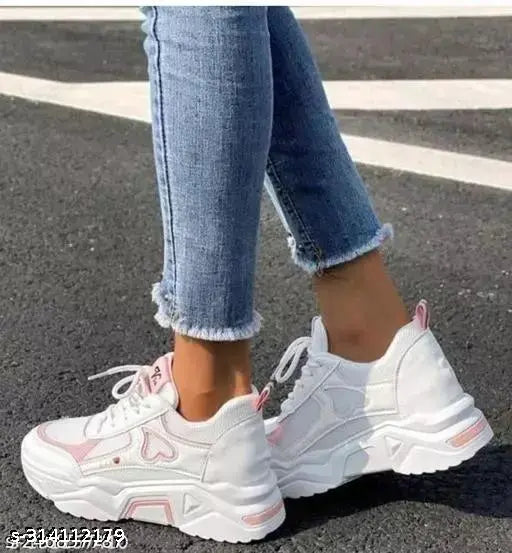 White mesh kids' casual sneakers, solid design with lace-up fastening, rubber sole, size N available in sizes 4 to 8. Made in India