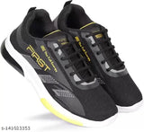 Black kids casual sports shoes with white soles and yellow laces