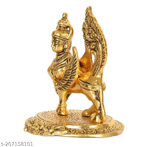 Yellow metal Kamadhenu cow statue (8cm x 11cm), symbolizing divine abundance and worshipped in Hinduism. Made in India