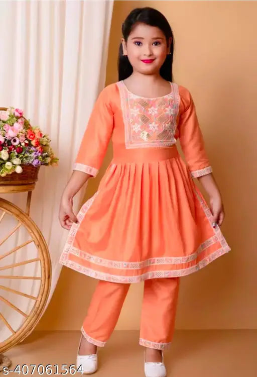 Rayon Naira seat kids ethnic wear, three-quarter sleeves with lace net bottom. Stylish kurta for Indian traditional casual and party wear