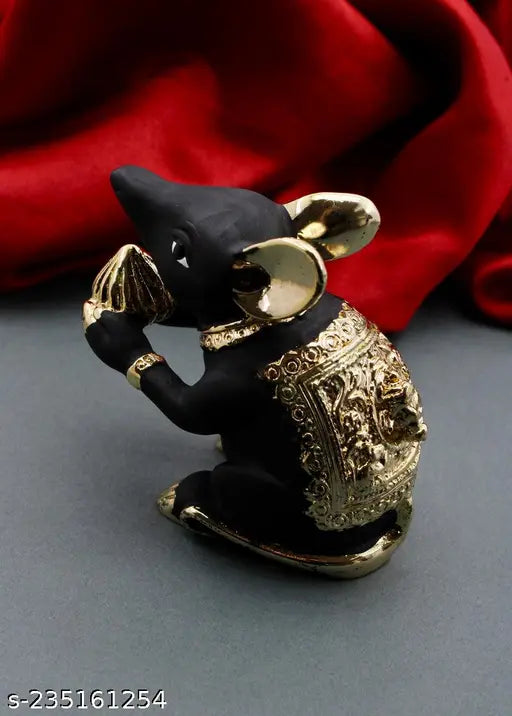 Black ceramic Ganpati Bappa mouse with golden Modak, Indian Ganesh Idol decor