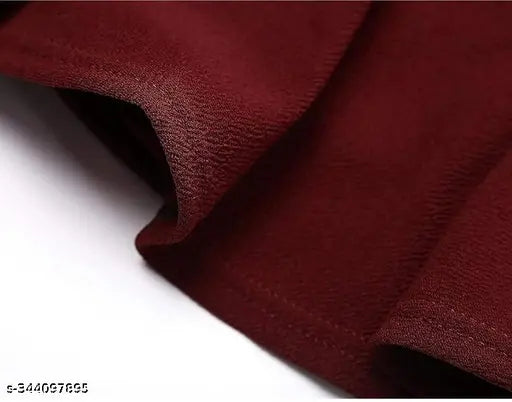 Girls' polycotton stretchy skater skirt with inner shorts and flared inskirt, solid color, dry clean only. Wide waistband for comfort, double layer design for sports. A-line silhouette, high waist, laser cutout scallop hem. Sizes: 26, 28, 30, 32, 34, 36 (in inches). Made in India