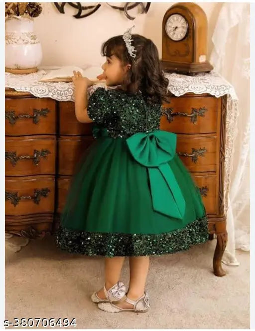 Deep green net baby girl queen wear, printed with captivating design, suitable for 2-9 years old children's dress-up play. Origin: India