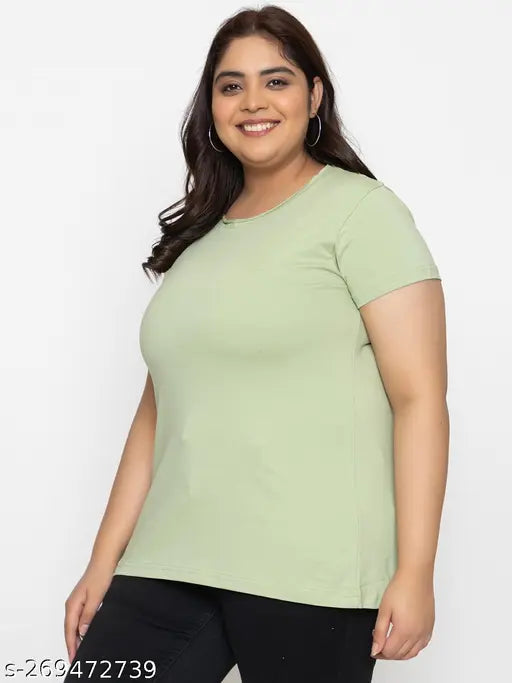 A woman in a light green, round neck half-sleeve cotton t-shirt