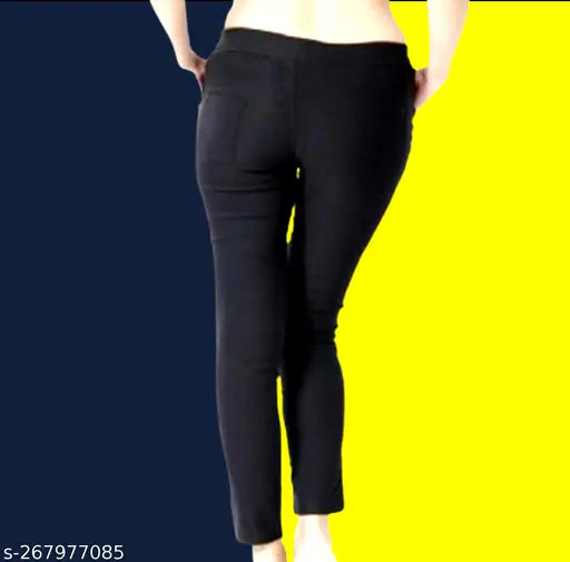 Black lycra slim fit jeggings for women, soft, stretchy, and lightweight premium fabric with button design and low rise. Machine washable. Sizes available: 24 (24in/35in/28in), 26 (26in/35in/28in), 28 (28in/35in/28in). Origin: India