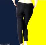 Black lycra slim fit jeggings for women, soft, stretchy, and lightweight premium fabric with button design and low rise. Machine washable. Sizes available: 24 (24in/35in/28in), 26 (26in/35in/28in), 28 (28in/35in/28in). Origin: India