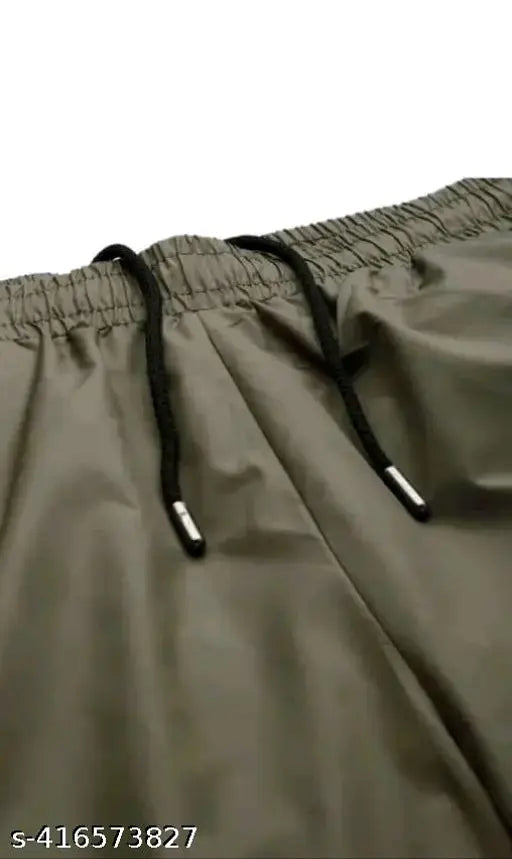 Gray cotton men's cargo pants with side pockets and drawstring closure