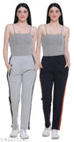 A set of two women's casual track pants in a solid white color with black side stripes