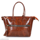 The brown leather purse with gold zippers, featuring a stylish side sling design