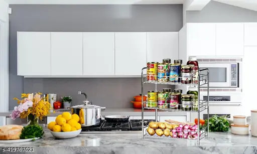 Silver-colored metal 3-tier kitchen rack with clear plastic containers for storage