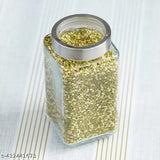 Transparent glass jar with lid, filled with green spices or herbs
