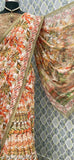 Colorful floral saree with a design that resembles autumn leaves