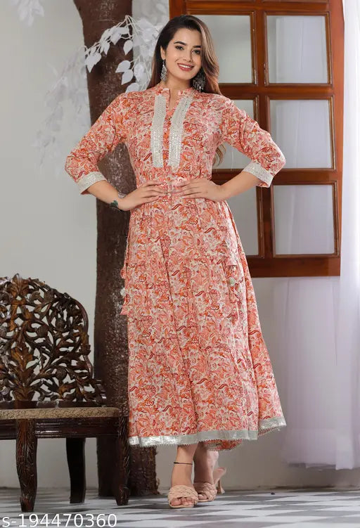 Beautiful orange rayon kameez with long sleeves and flared bottom, traditional embroidery
