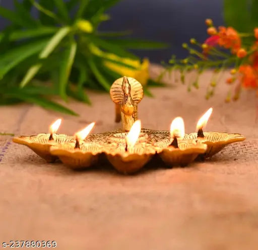 Aluminum Panchmukhi Arti Diya for pooja table, Indian god idol with dimensions 19cm x 23cm x 7.5cm