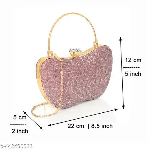 A pink apple-shaped resin clutch purse, handcrafted with a gold chain strap