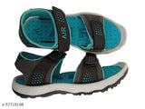 Blue and black sandals with a design that could be perceived as funky