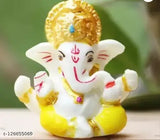 Handcrafted Poly Resin Ganesha Idol for home decor, car dashboard gifts. Modern avatar of Lord Ganesha statue in Religious Idols adds spiritual touch. Premium quality material, 5 cm L x 5 cm H x 5 cm B. Perfect for housewarming, wedding or office gift. Handicraft item, made by Miss Peach artists. Brings prosperity and success per Vastu, India origin