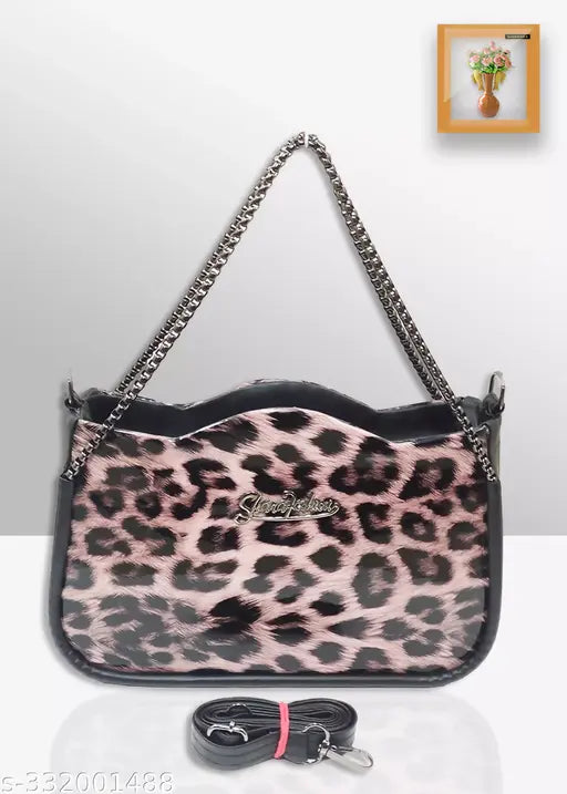 Black crossbody bag with leopard print fabric and multiple pockets, zip closure