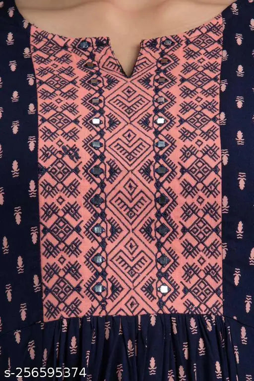 Navy blue embroidered Anarkali dress with intricate pattern, tassel detailing on shoulders and waist, sleeveless design