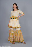 Blush pink and white block print sharara kurta set with flared bottoms, embellished borders