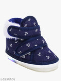 Navy blue canvas baby booties with PVC soles, printed pattern, slip-on design, and back detail. Perfect for infants 6 to 24 months
