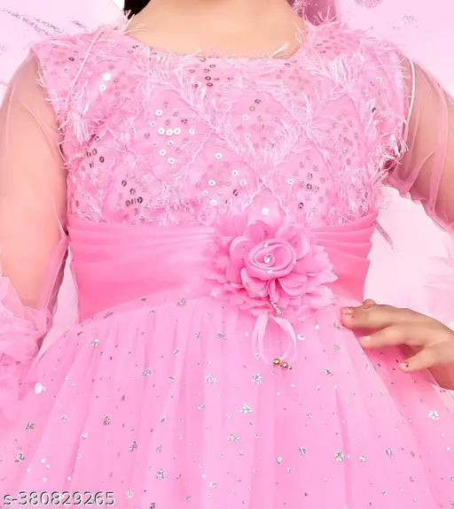 Pink satin dress with ruffled trim, round neckline
