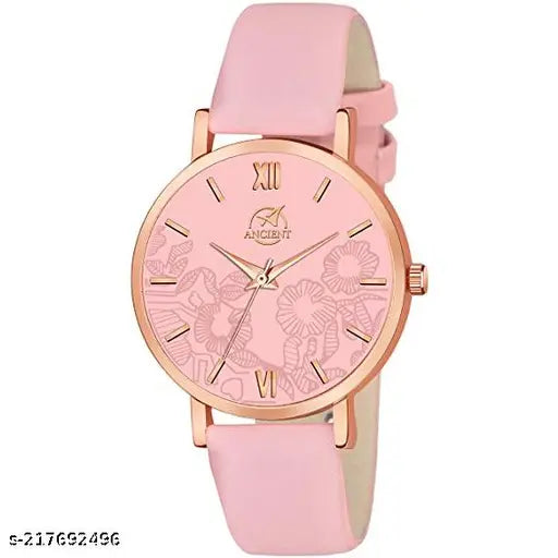 The image displays a watch with a pink strap, showcasing a unique flower design on the face. It is an analog watch with a leather belt strap