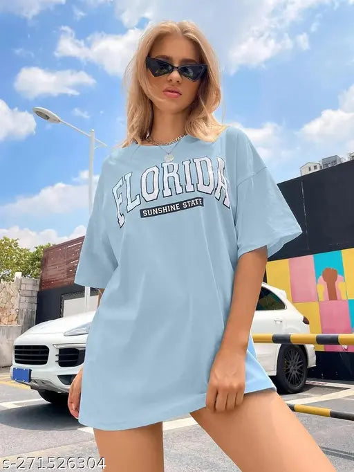 Oversized printed tee top in navy, Florida-themed branding, loose fit, sleeveless